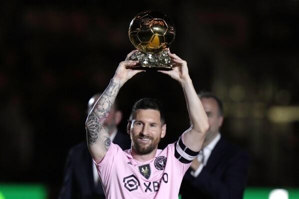 Lionel Messi s Ballon D Or trophy celebrated by Inter Miami AP News